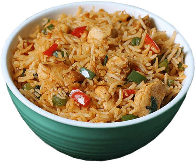 A Bowl Of Rice With Chicken And Vegetables