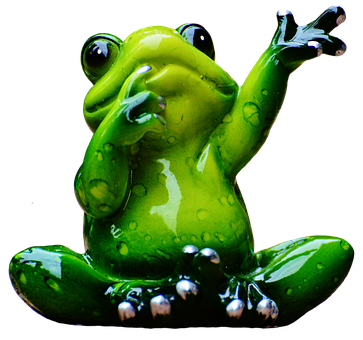A Green Frog Figurine With Black Background