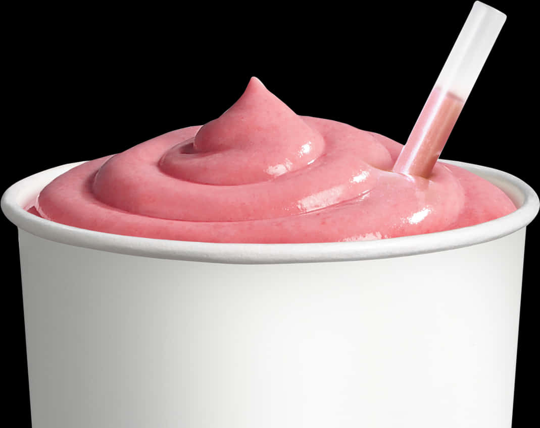 A Cup Of Pink Yogurt With A Straw