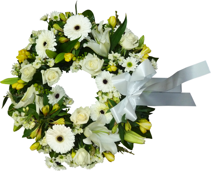 A Wreath Of Flowers With A White Ribbon