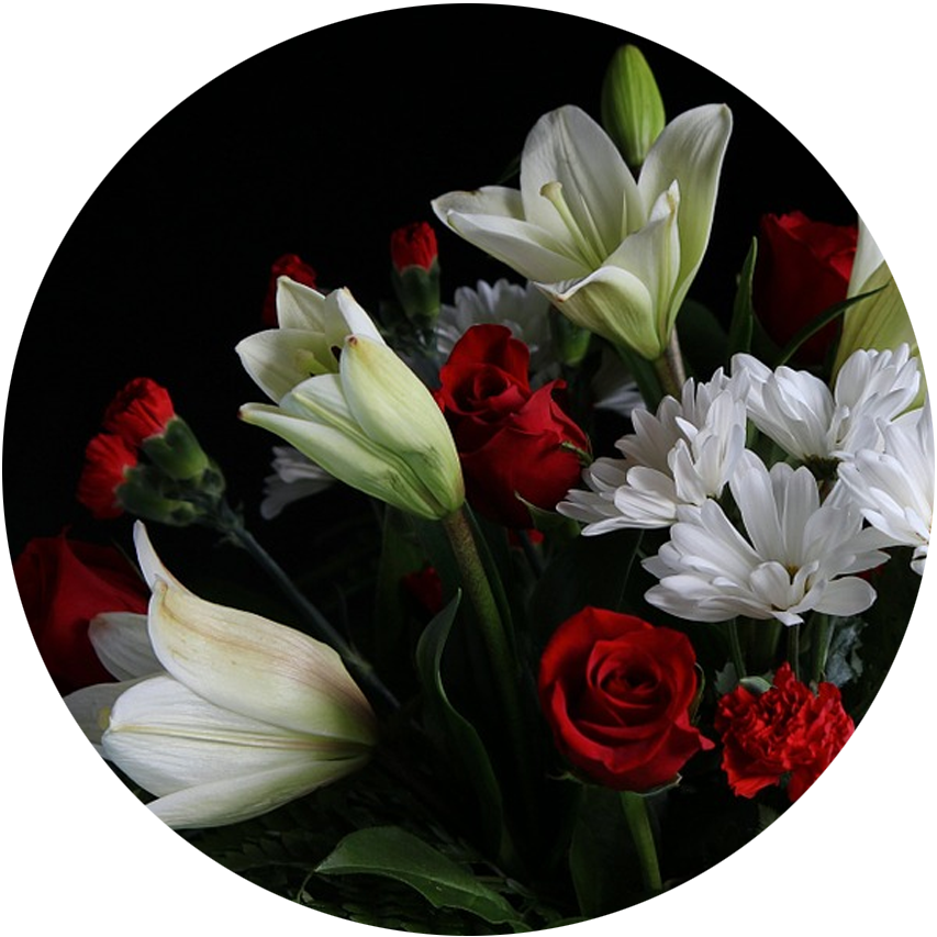 A Bouquet Of Flowers With A Black Background