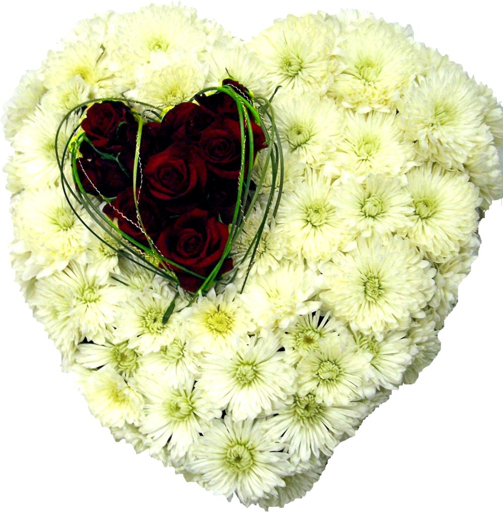 A Heart Shaped Arrangement Of White Flowers