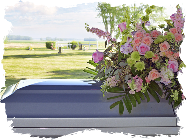 A Bouquet Of Flowers On A Coffin