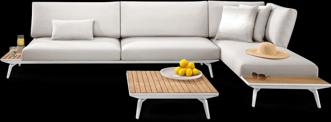 A White Couch With A Plate Of Lemons On It