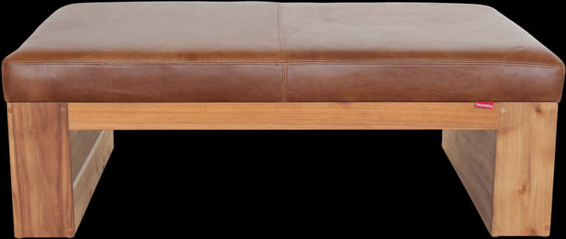 A Brown Leather Bench With Black Background