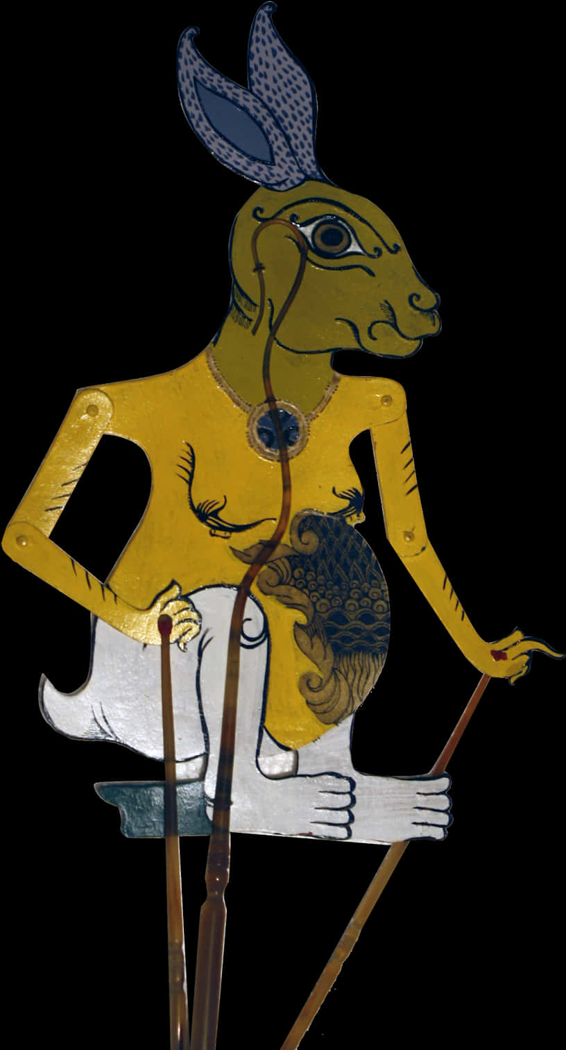 A Yellow Monkey Puppet With Black Background