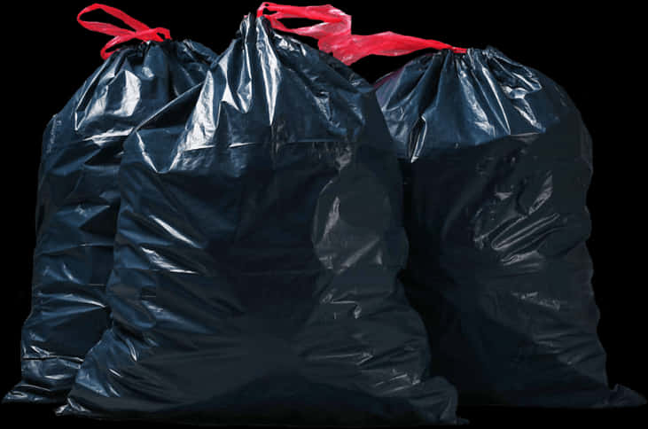 A Group Of Black Garbage Bags