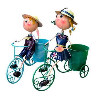 A Metal Figurines On A Bicycle