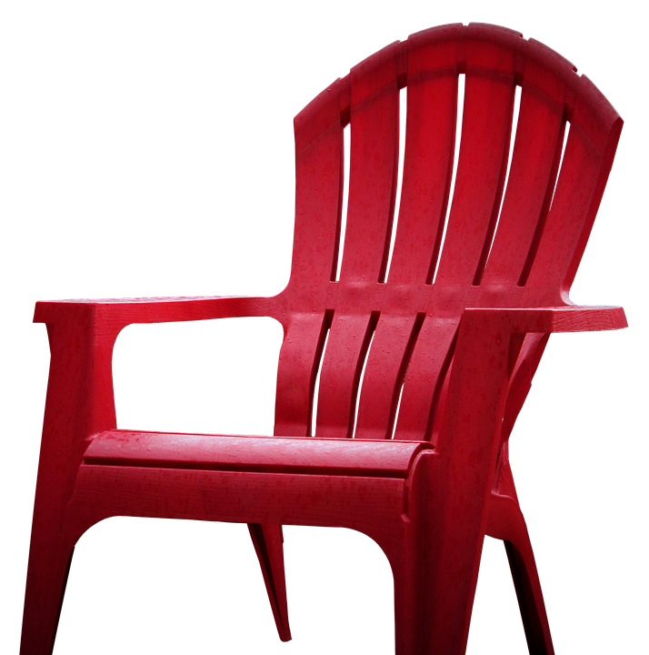 A Red Plastic Chair With A Black Background