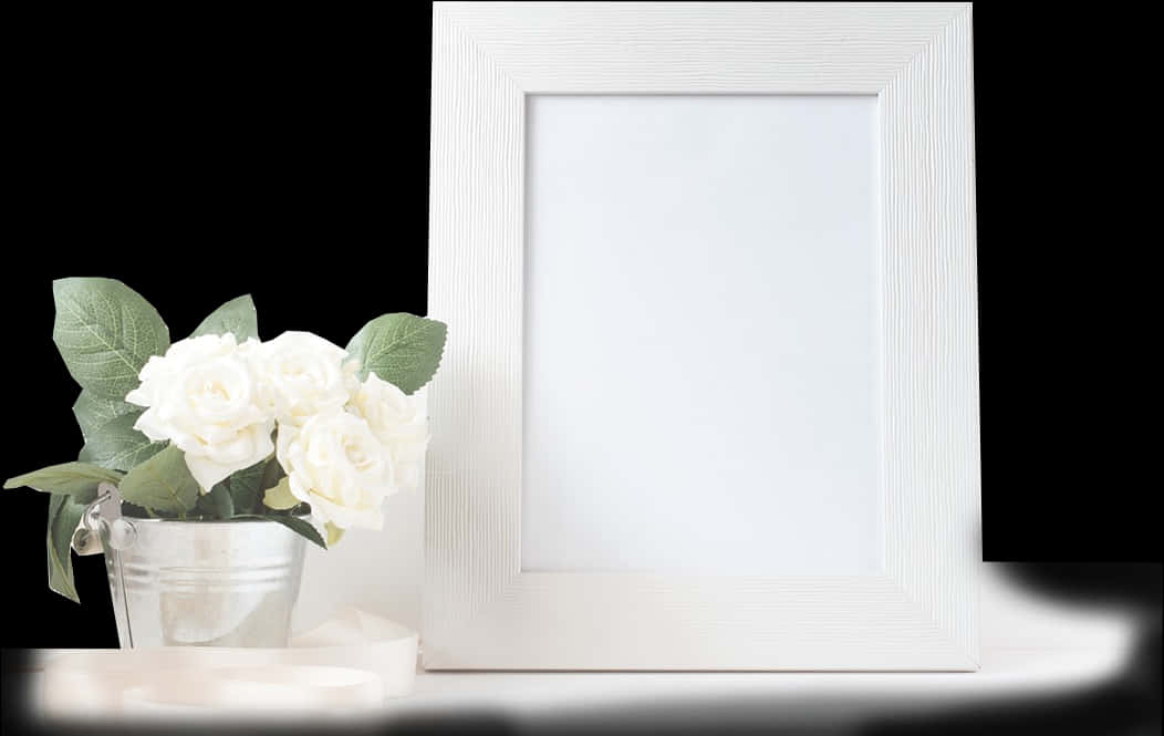 A White Frame With A Bouquet Of Flowers In A Bucket
