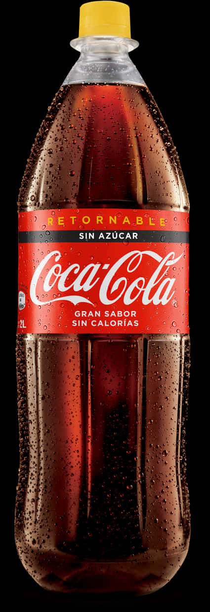 A Bottle Of Soda With A Red Label