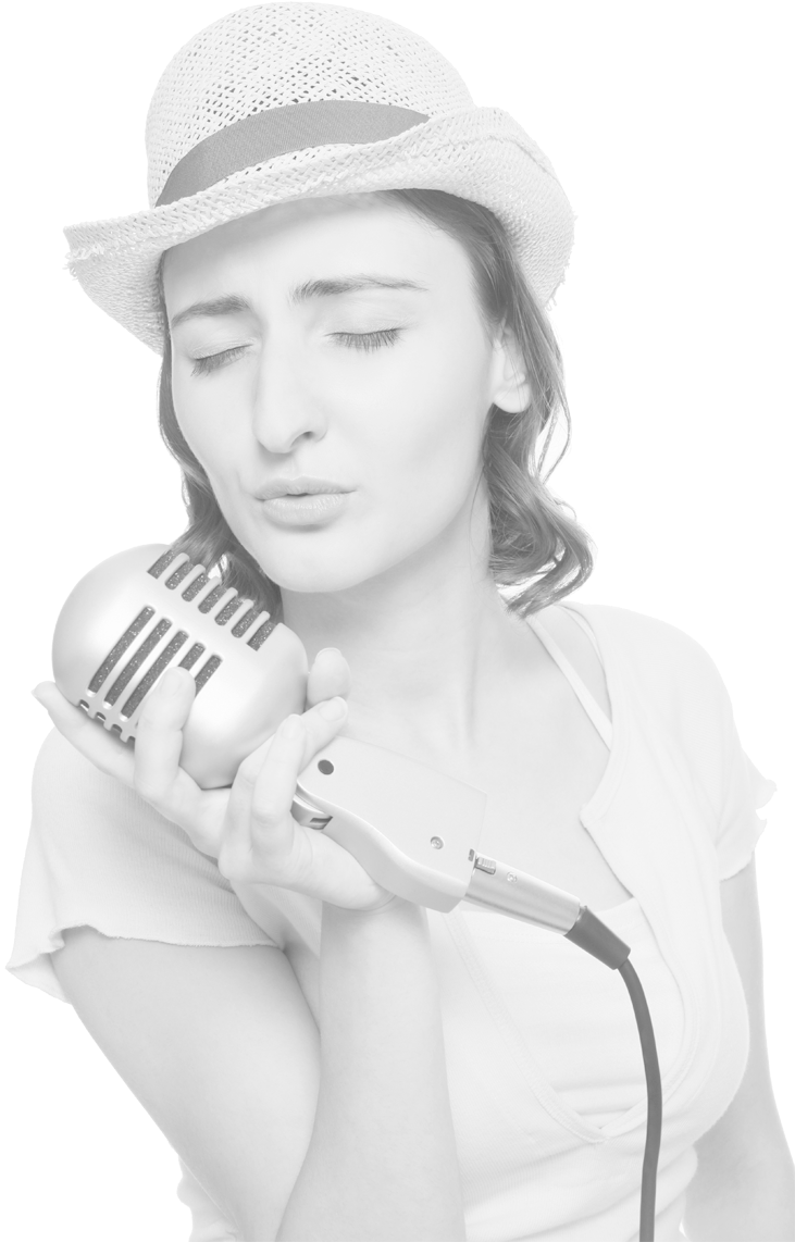 A Woman Wearing A Hat Holding A Microphone