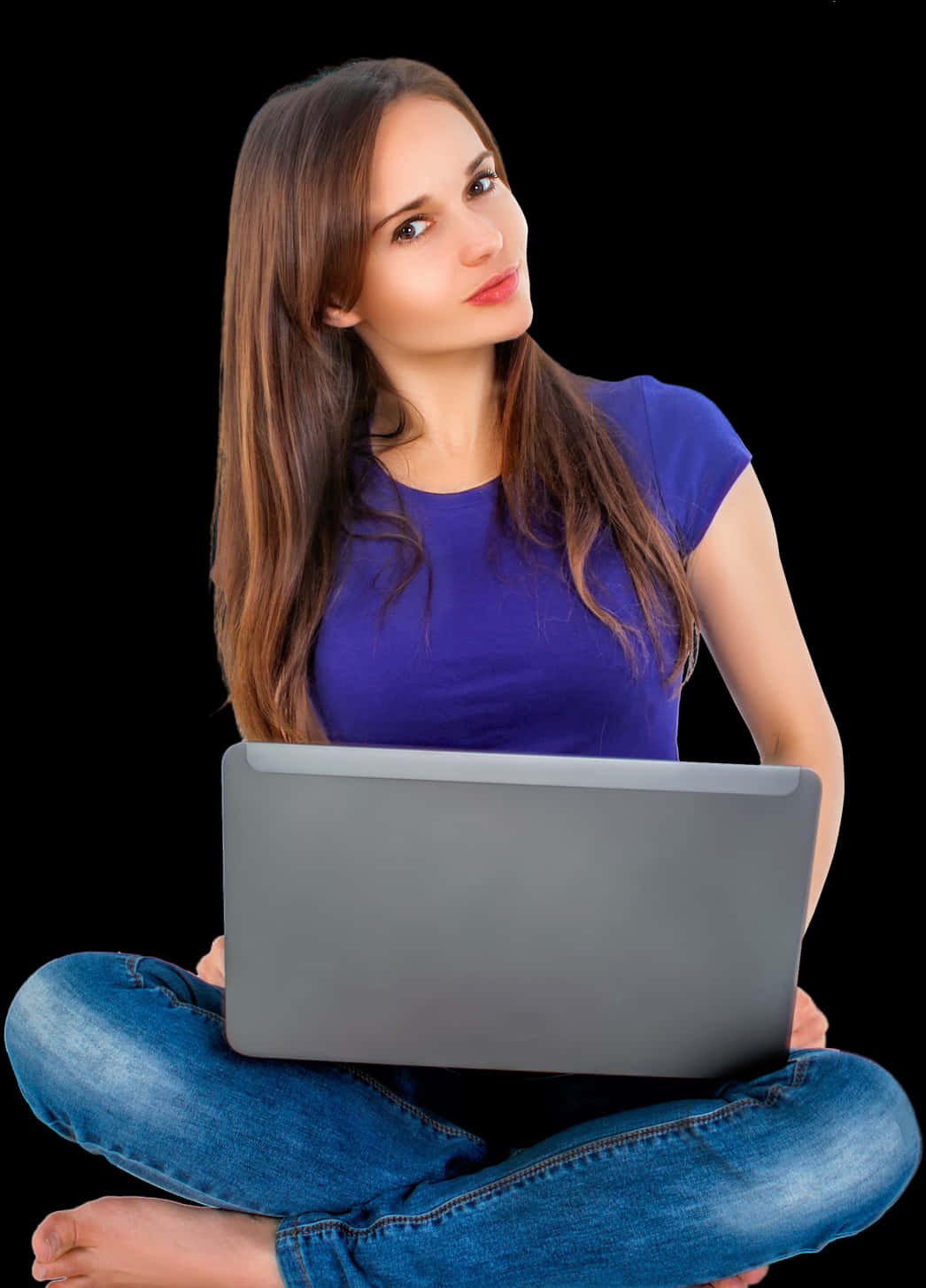 A Woman Sitting Cross Legged With A Laptop