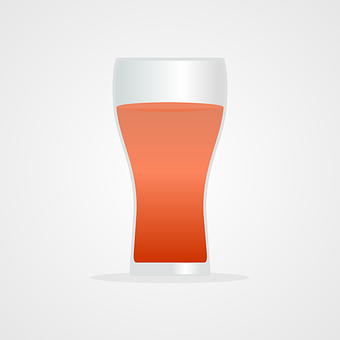 A Glass Of Beer With Orange Liquid