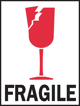 A Red And Black Sign With A Broken Glass
