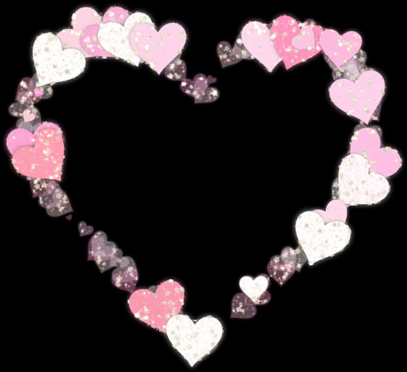 A Heart Shaped Frame Made Of Pink And White Hearts