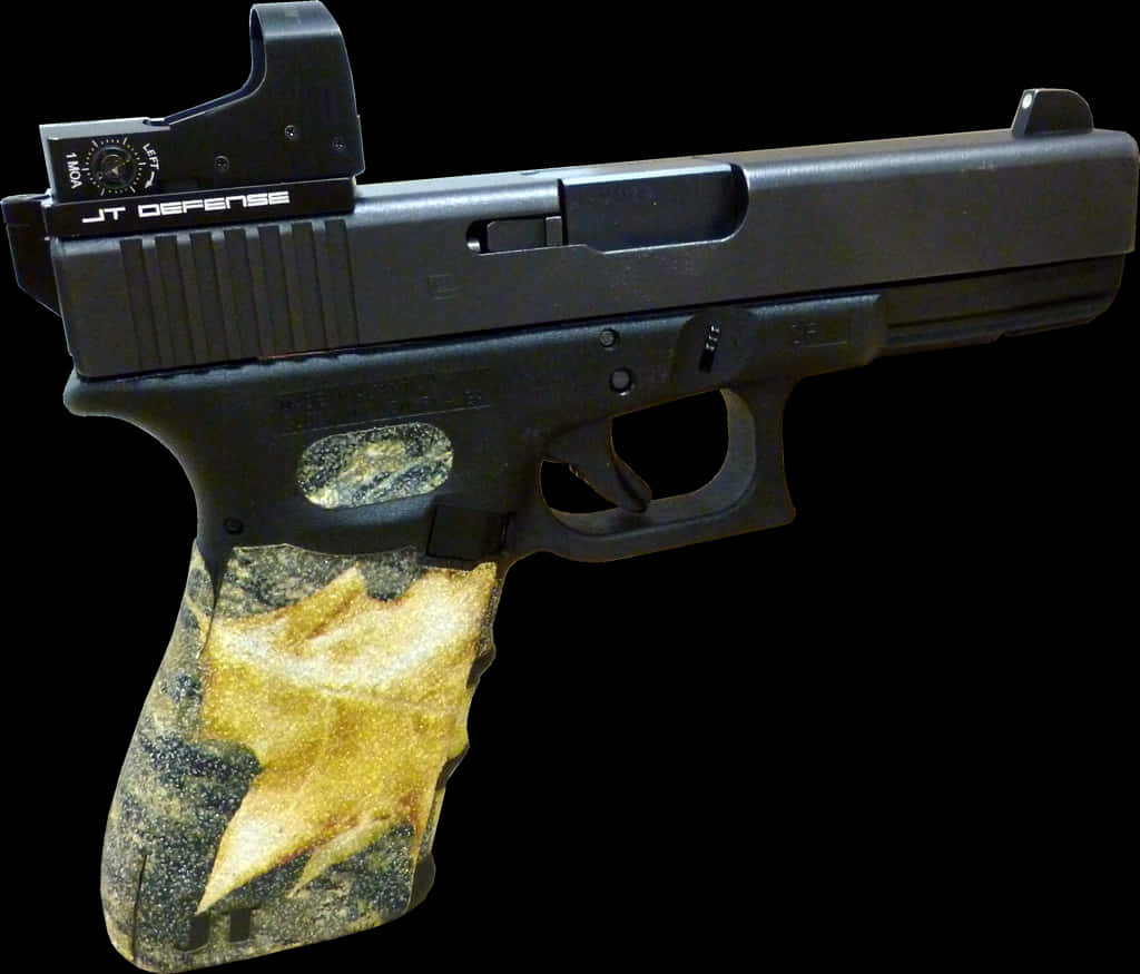 A Black Gun With A Gold Star On The Side