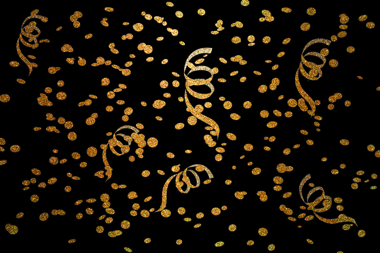 A Gold Confetti On A Black Background