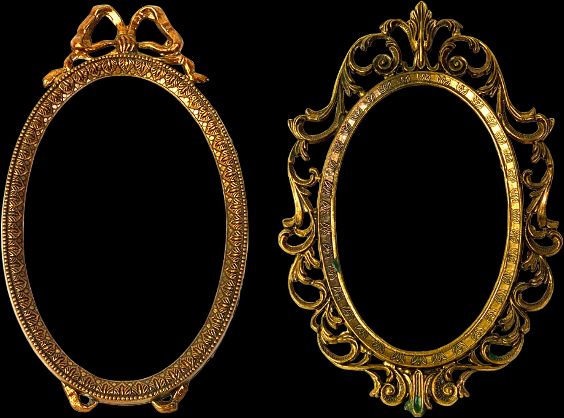 A Pair Of Oval Gold Frames