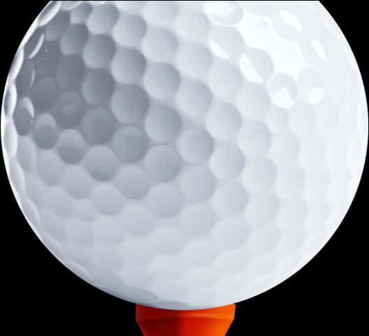 Golf Ball On Orange Tee