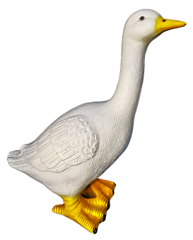 A White Duck Statue With Yellow Feet
