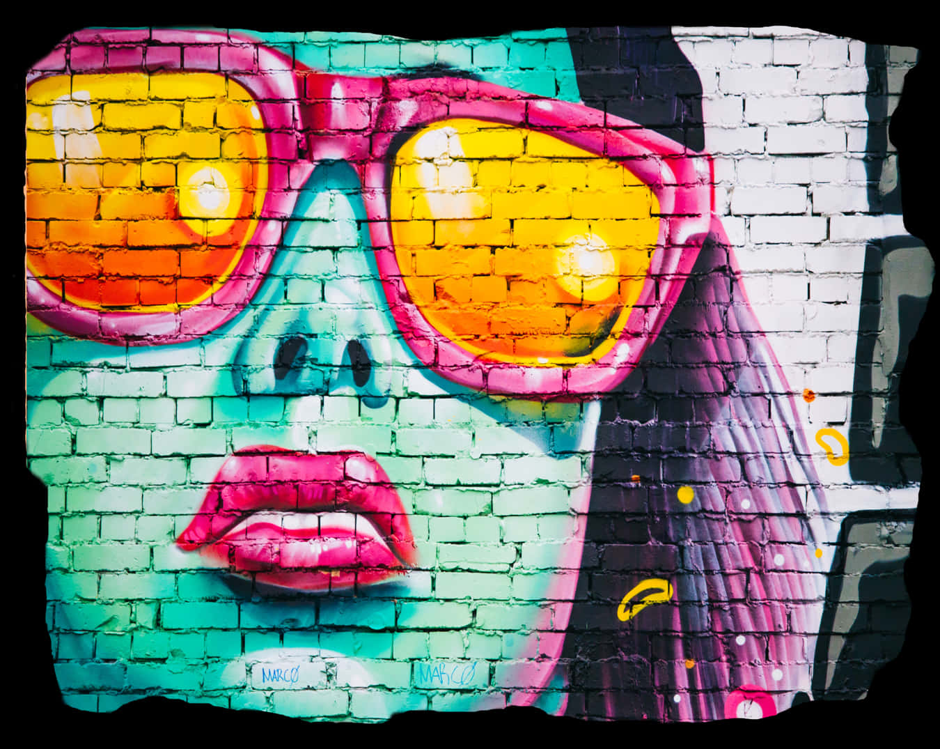 A Mural Of A Woman Wearing Sunglasses