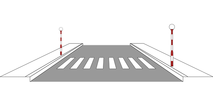 A Crosswalk With A Pole