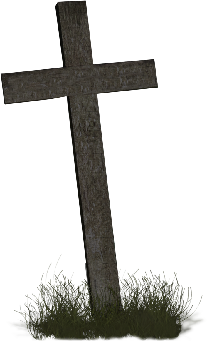 A Wooden Cross In Grass