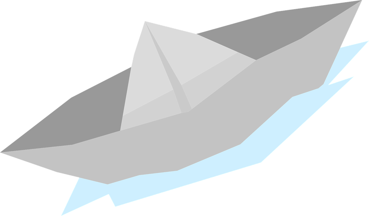 A Paper Boat On A Black Background