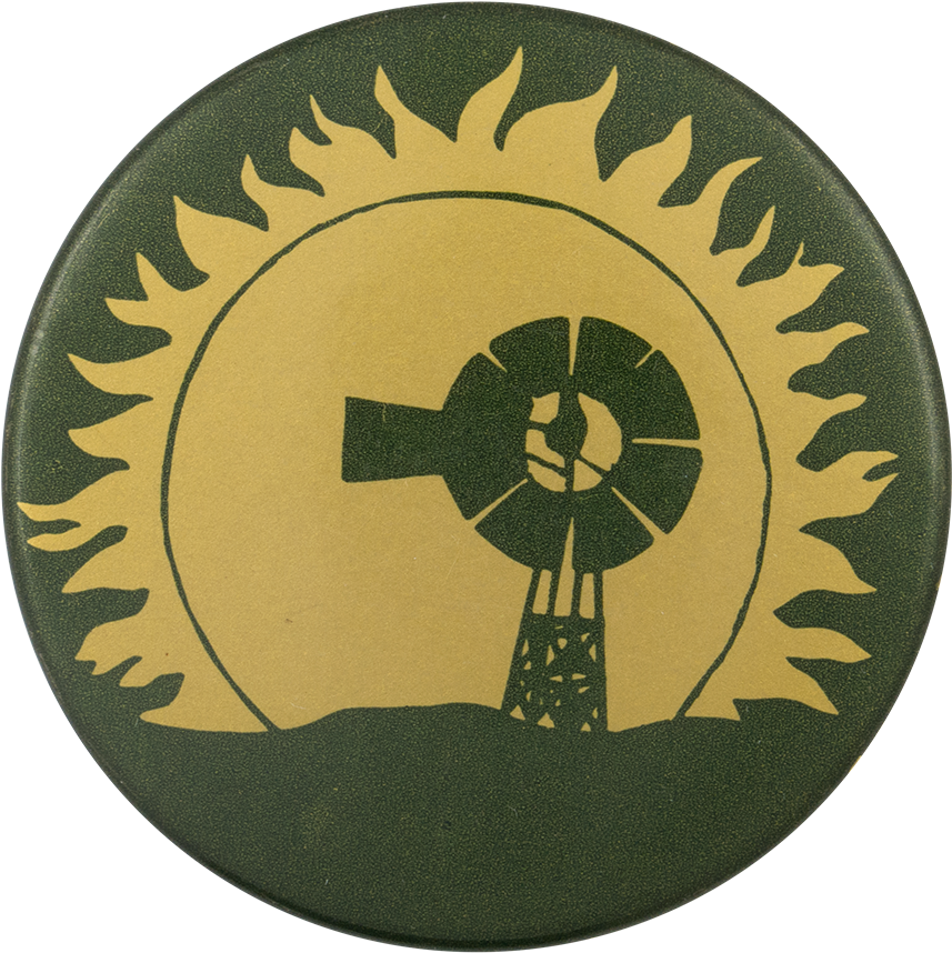 A Circular Object With A Windmill In The Sun