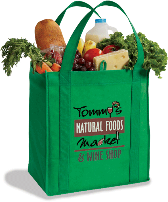 A Green Shopping Bag Full Of Groceries