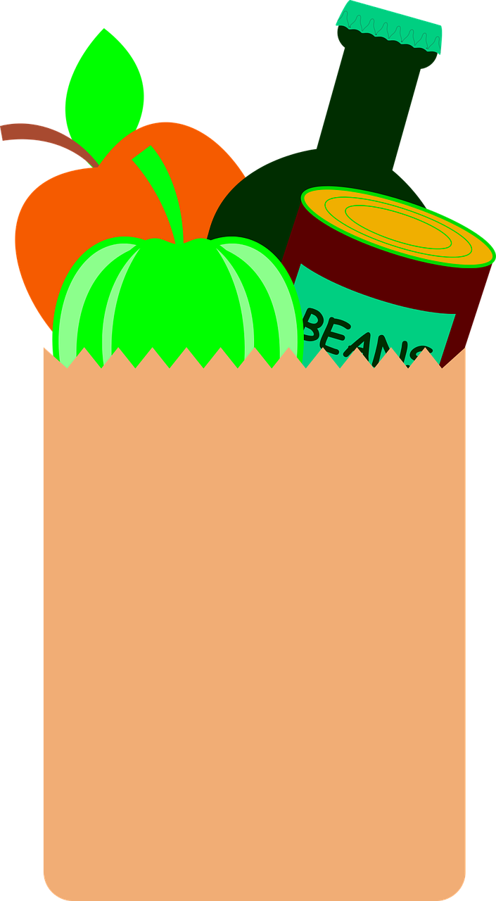 A Bag Of Food With A Fruit And A Can Of Beans