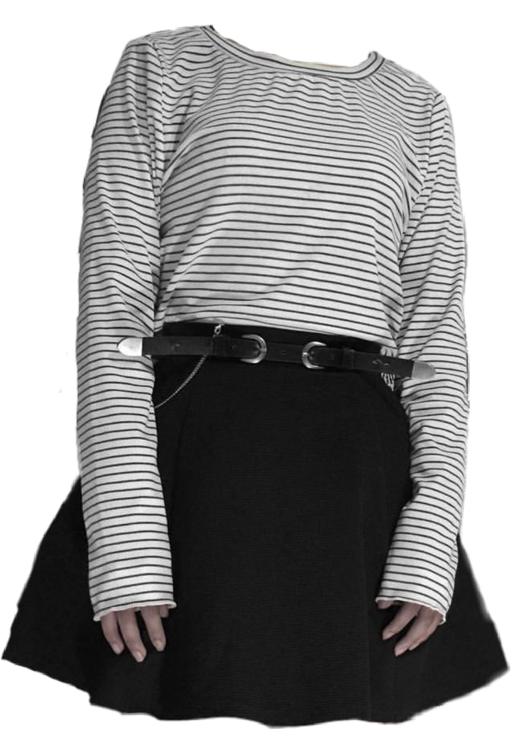 A Woman Wearing A Black Skirt And A Striped Shirt