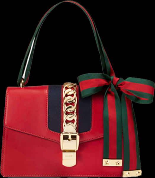 A Red And Green Purse With A Bow