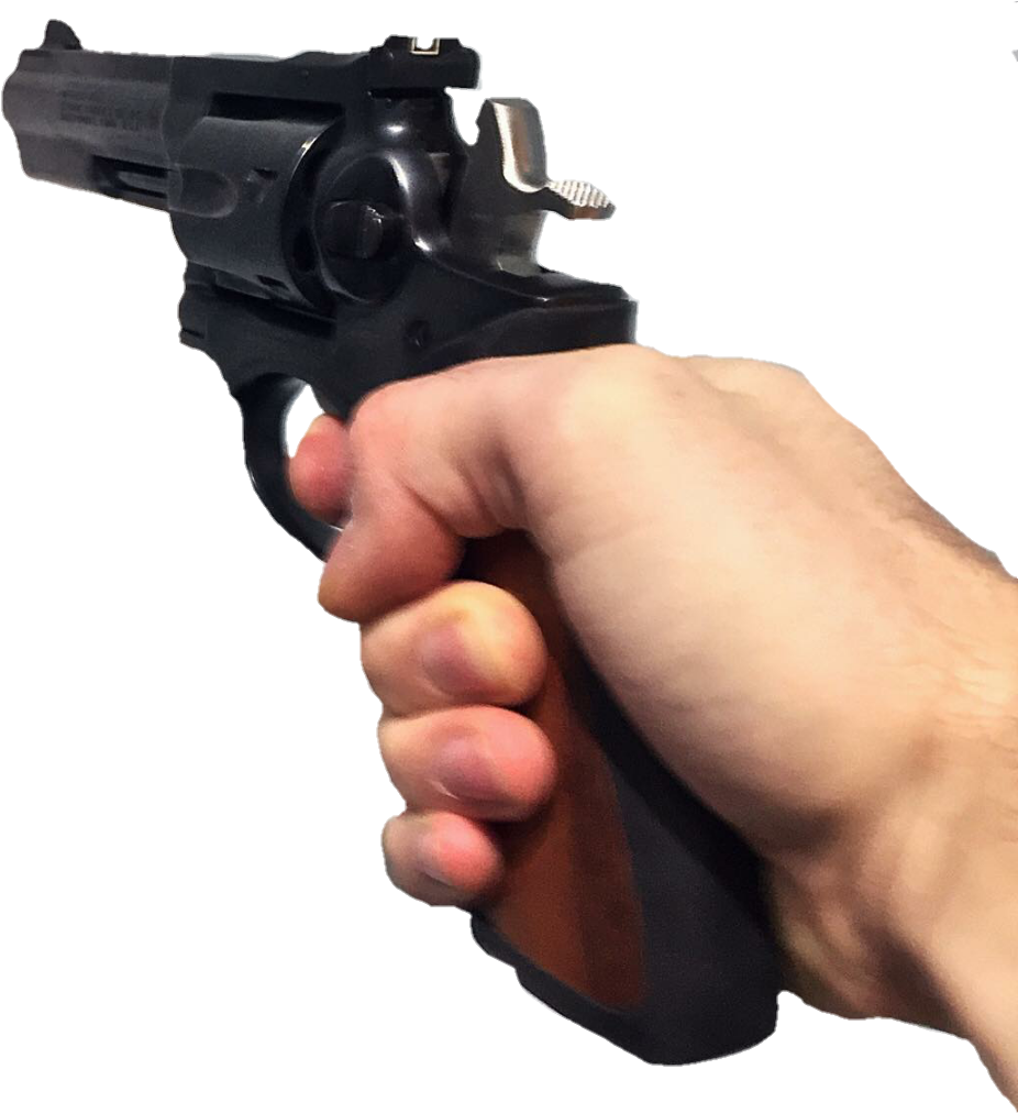 A Hand Holding A Gun