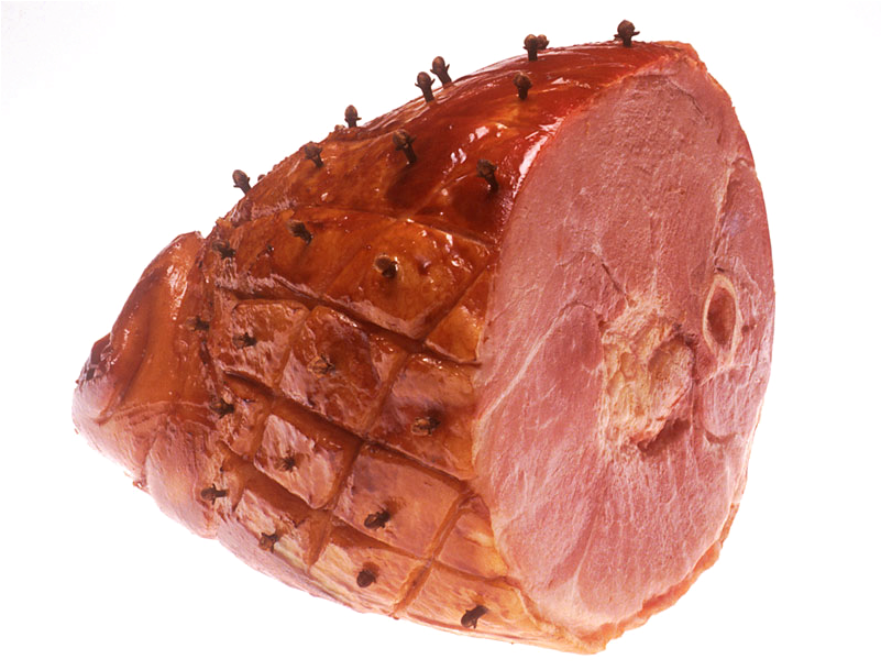 A Piece Of Ham With Small Black Nails