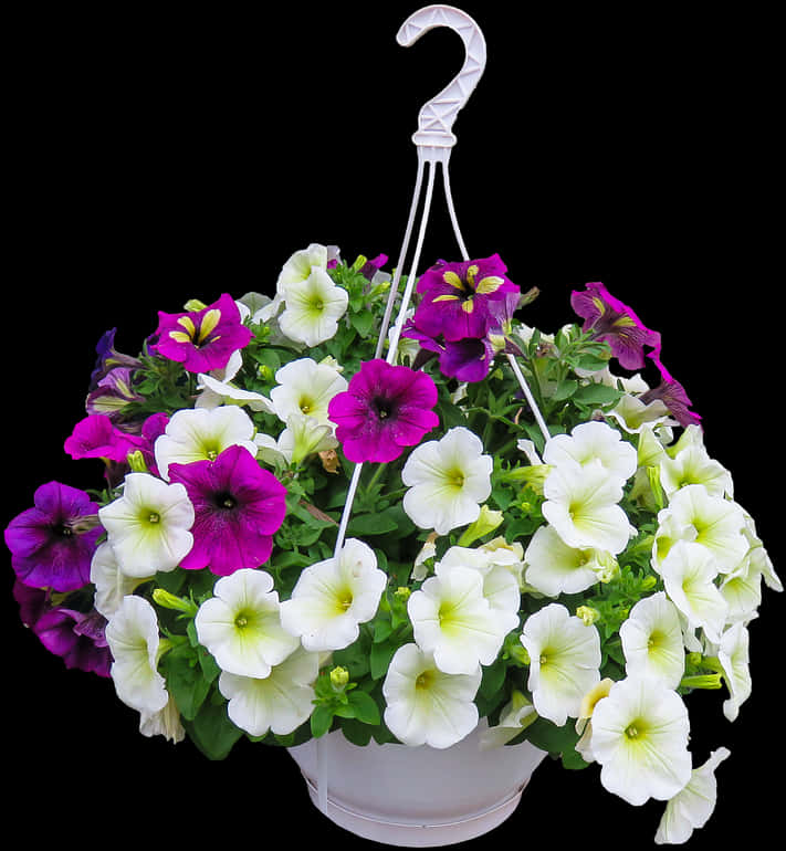 A Basket Of Flowers With A White Handle
