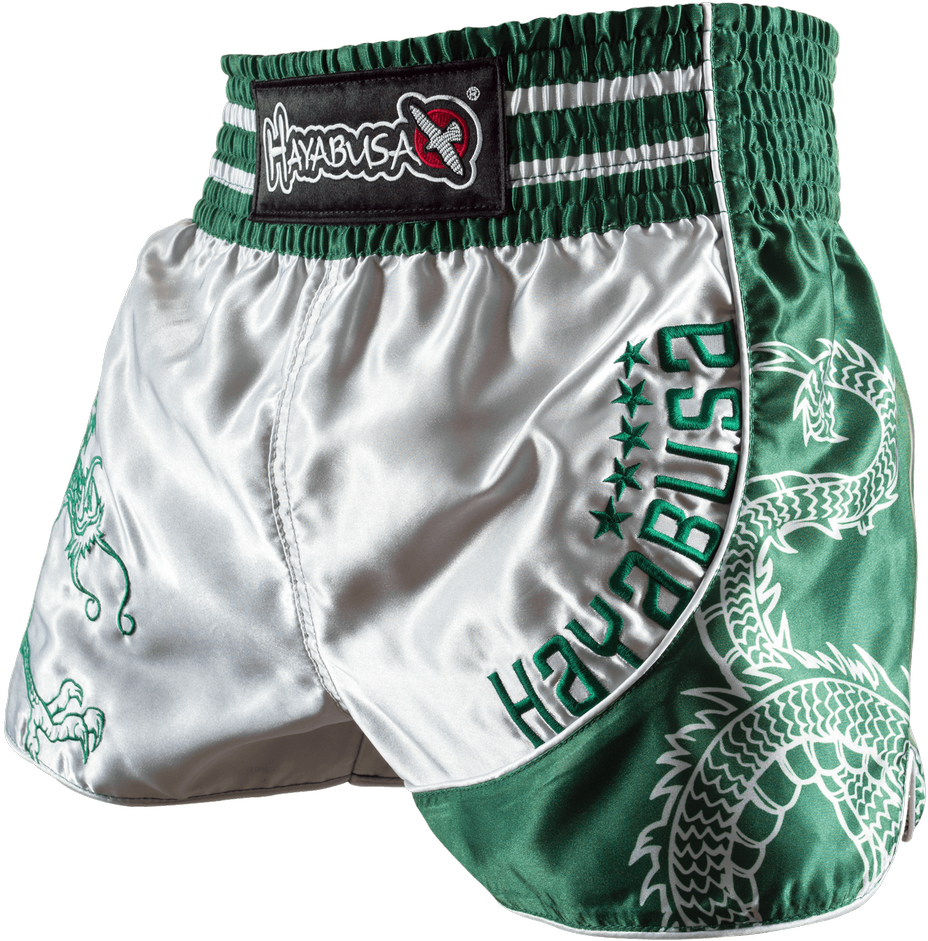 A Green And White Shorts With A Dragon Design