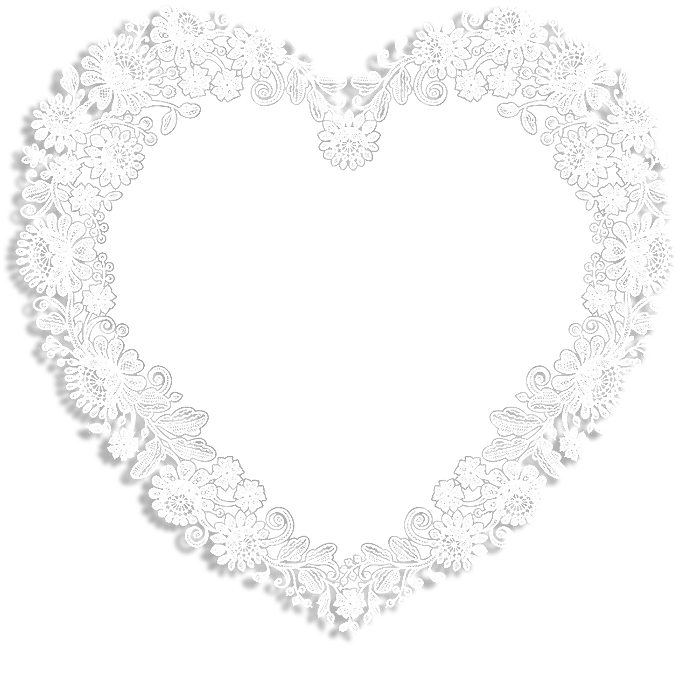 A White Lace Heart With Flowers On It