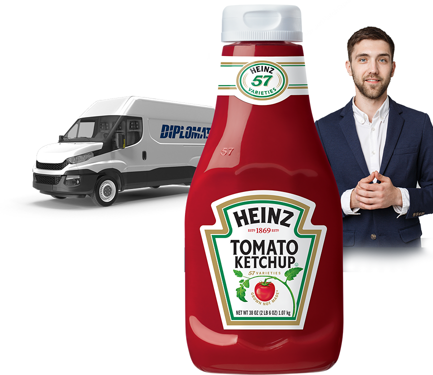 A Man Standing Next To A Bottle Of Ketchup
