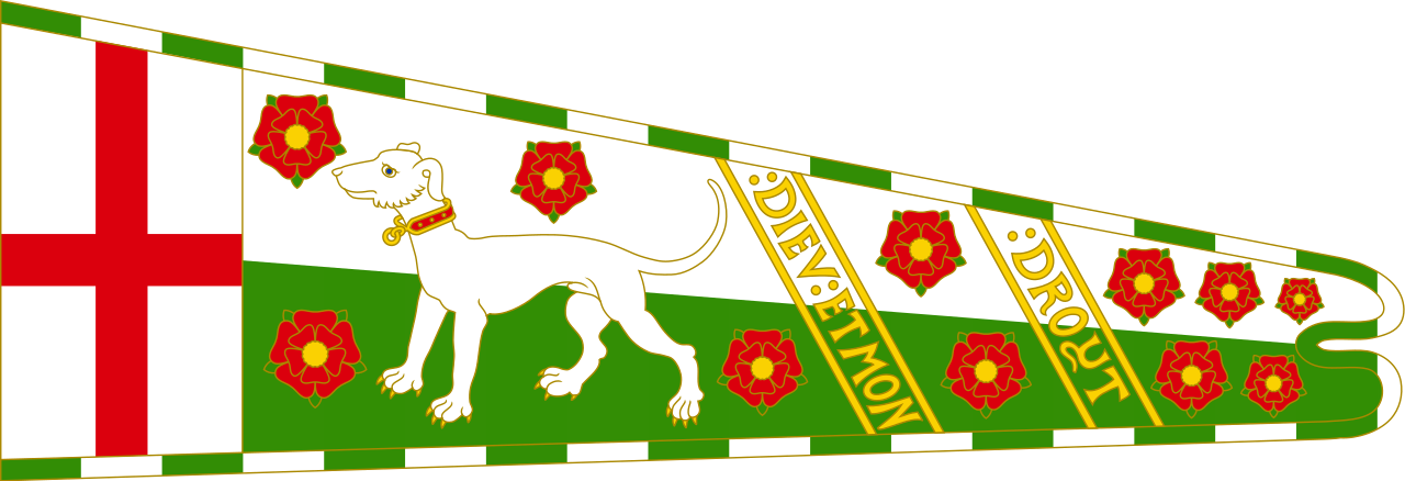 A White Dog With Red Flowers On A Green And White Flag