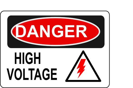 A Sign With A Red And White Sign With A Triangle And A Lightning Bolt