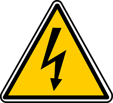 A Yellow Triangle Sign With Black Lightning Bolt