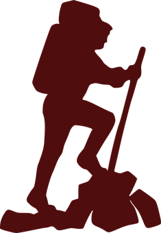 A Silhouette Of A Man Holding A Shovel