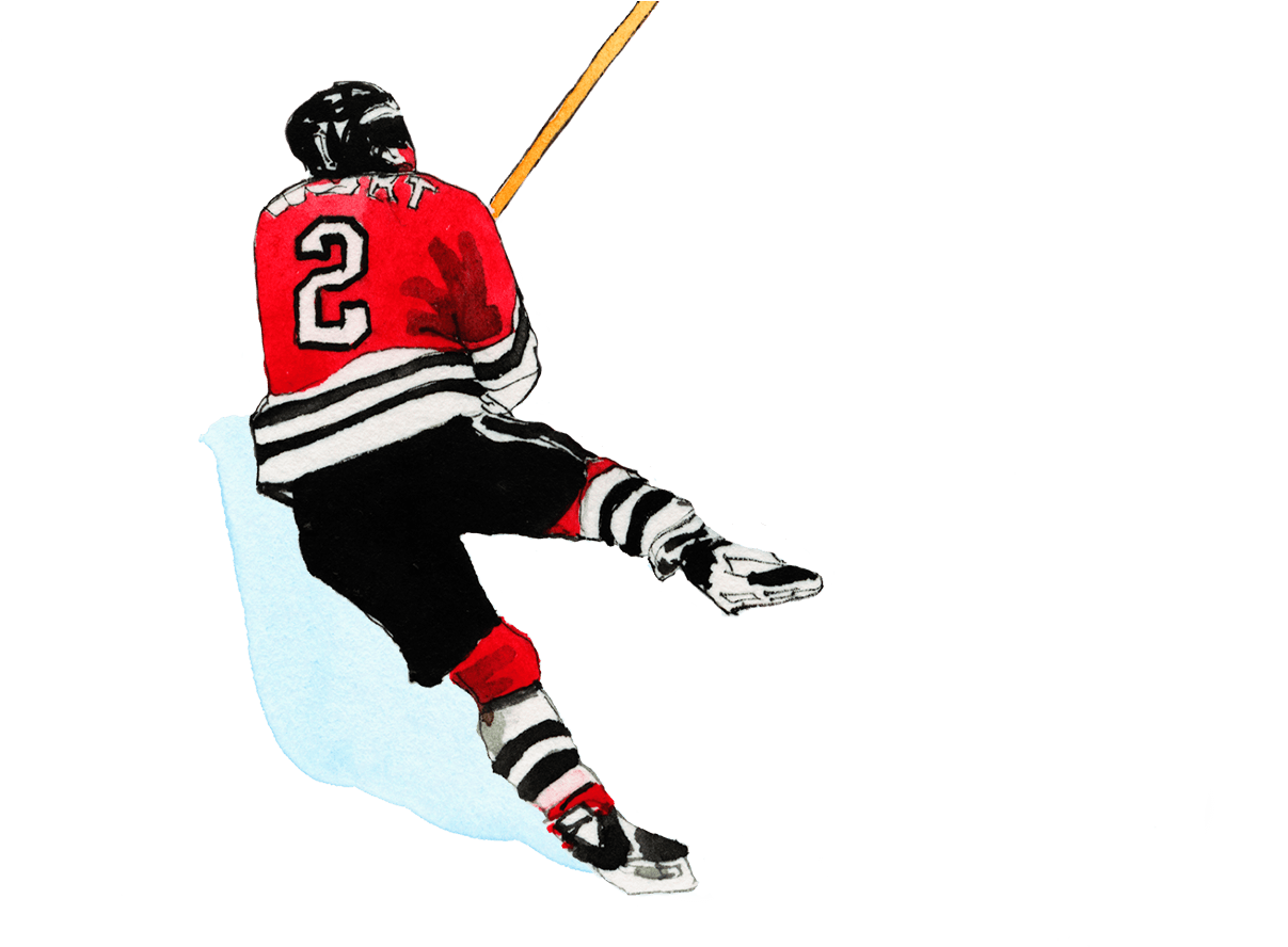 A Hockey Player In Red Jersey And Black Shorts With A Yellow Stick