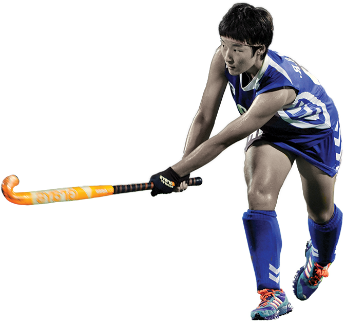 A Man In A Blue Uniform Holding A Hockey Stick