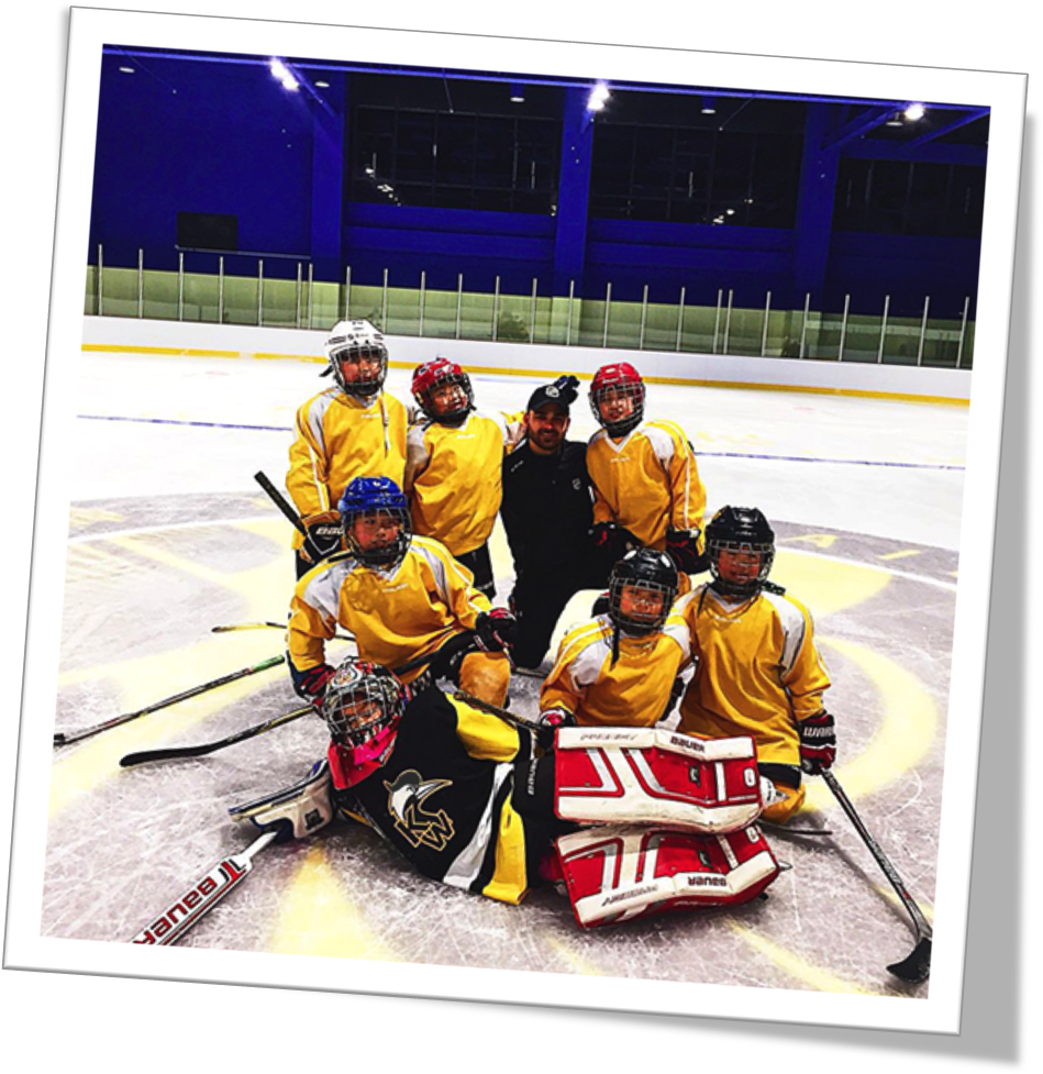 A Group Of Hockey Players Posing For A Photo