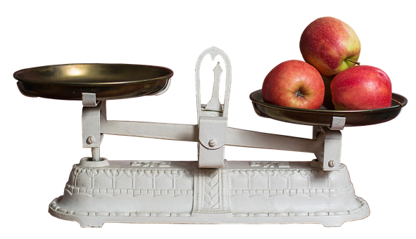 A White Scale With Apples On It