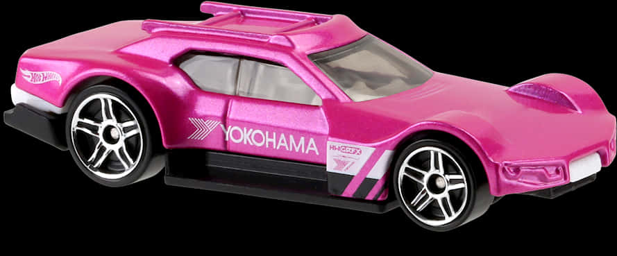 A Pink Toy Car On A Black Background