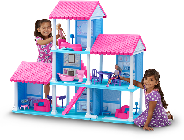 Two Girls Smiling Next To A Doll House